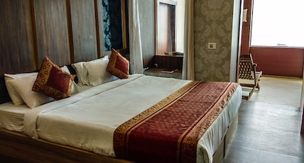 Dwivedi Hotels (Sri Omkar Palace) Room Type - Nandi Room River view (Darshan Assistance for Kashi Vishwanath Temple Available) Dwivedi Hotels (Sri Omkar Palace) Room Type - Nandi Room River view (Darshan Assistance for Kashi Vishwanath Temple Available)