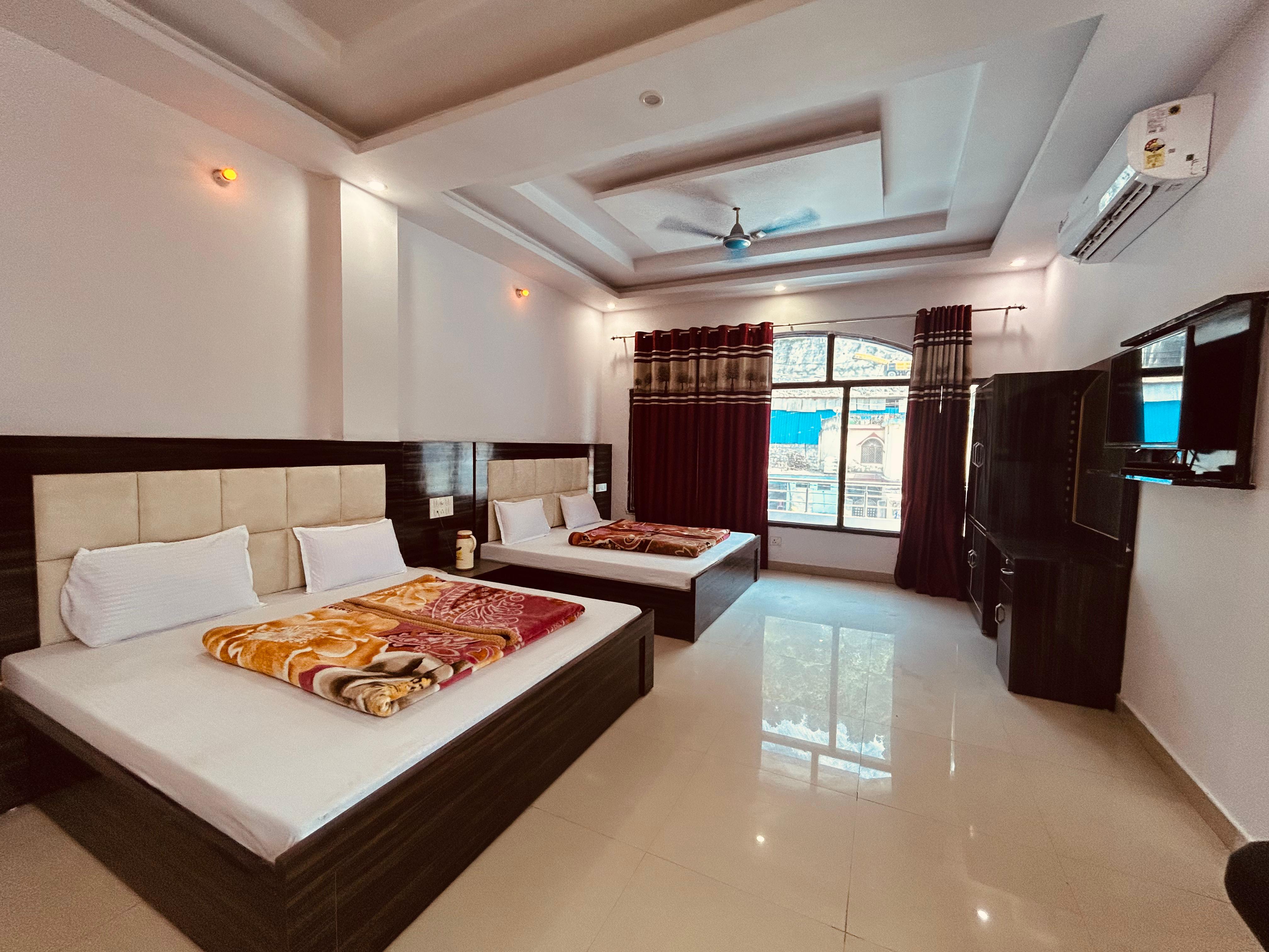 Hotel Aradhana - Tap to explore photos