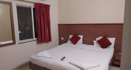 HOTEL SURYAVILLA Room Type - Deluxe AC Room