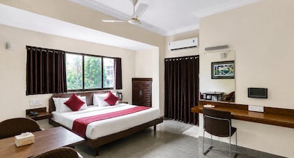 Hotel Hospice Opp. Surat Railway Station East, Khand Bazar, Varachha Road. Room Type - Super Deluxe Room Hotel Hospice Opp. Surat Railway Station East, Khand Bazar, Varachha Road. Room Type - Super Deluxe Room