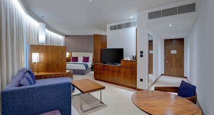 Crowne Plaza Muscat OCEC Room Type - 1 King Junior Suite Garden View Lounge Access Crowne Plaza Muscat OCEC Room Type - 1 King Junior Suite Garden View Lounge Access