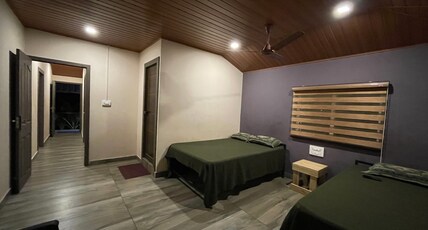 Pamba pool cottage & rooms Room Type - Twin Bed Room 