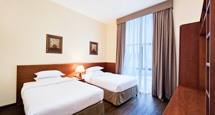 Ramada Hotel & Suites by Wyndham Ajman Room Type - 1 Twin Bed Suite