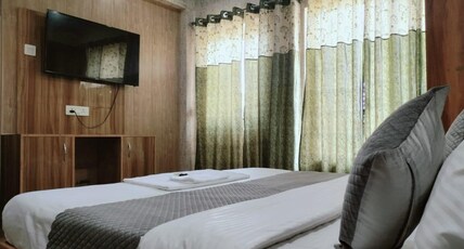 Tejas Residency & Restaurant Room Type - Delux Standard Room E