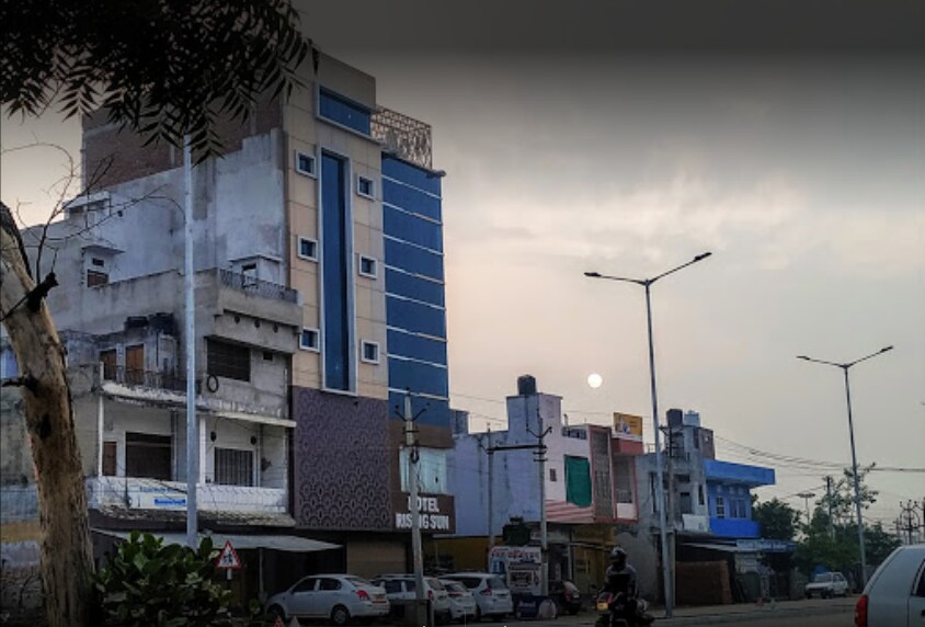 Hotel Rising Sun Malpura - Tap to explore photos