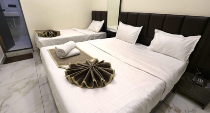 Hotel Bansi Palace - Managed By Dwarka Dekho Room Type - King and Twin Family Room