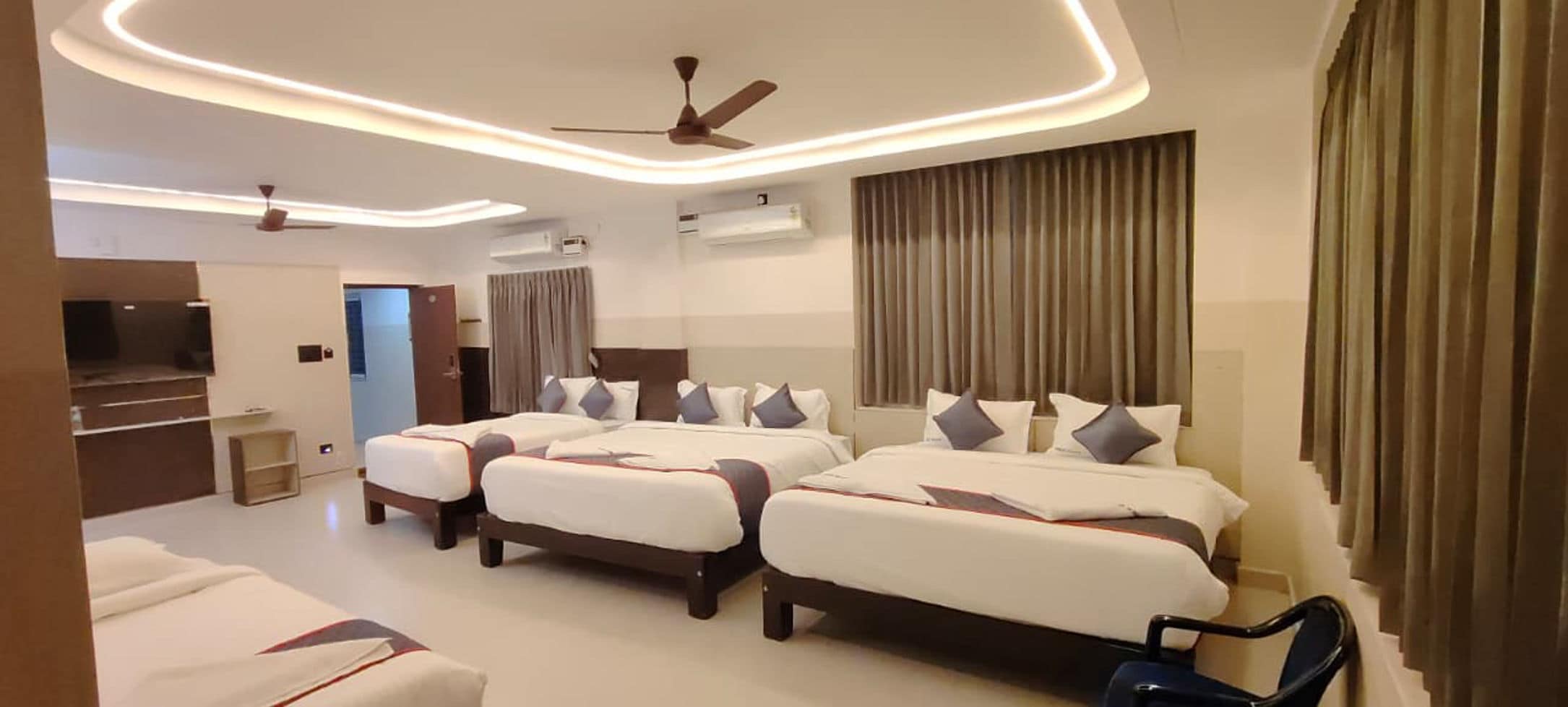 MKK Grand Luxury Suite & AC Rooms - Tap to explore photos