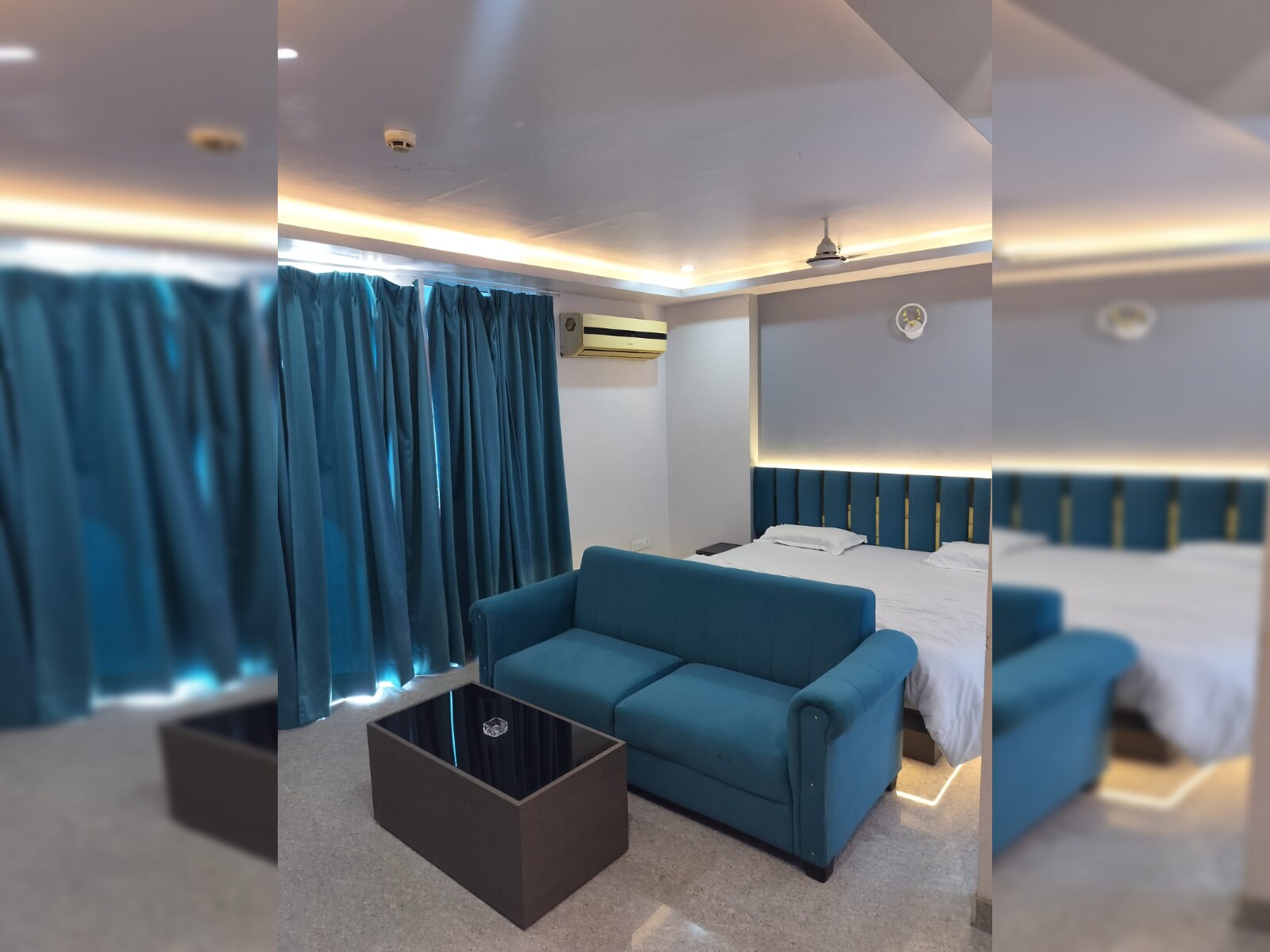 Manthan The Comfort Stay - Tap to explore photos