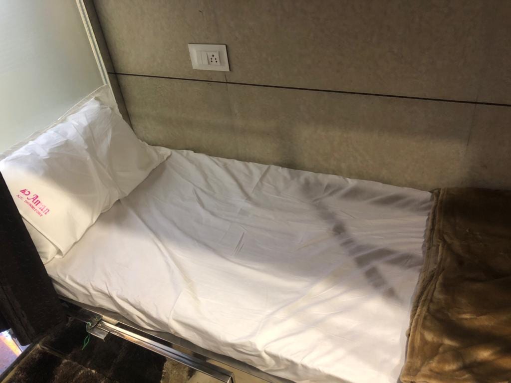 Aman AC Dormitory & Guest House - Tap to explore photos