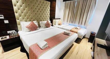 NPG Hotel, Near Kempegowda International Airport Room Type - Triple Room