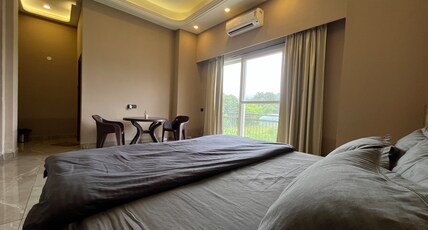 Anandam Homestay Room Type - Room with King Size Bed and Balcony