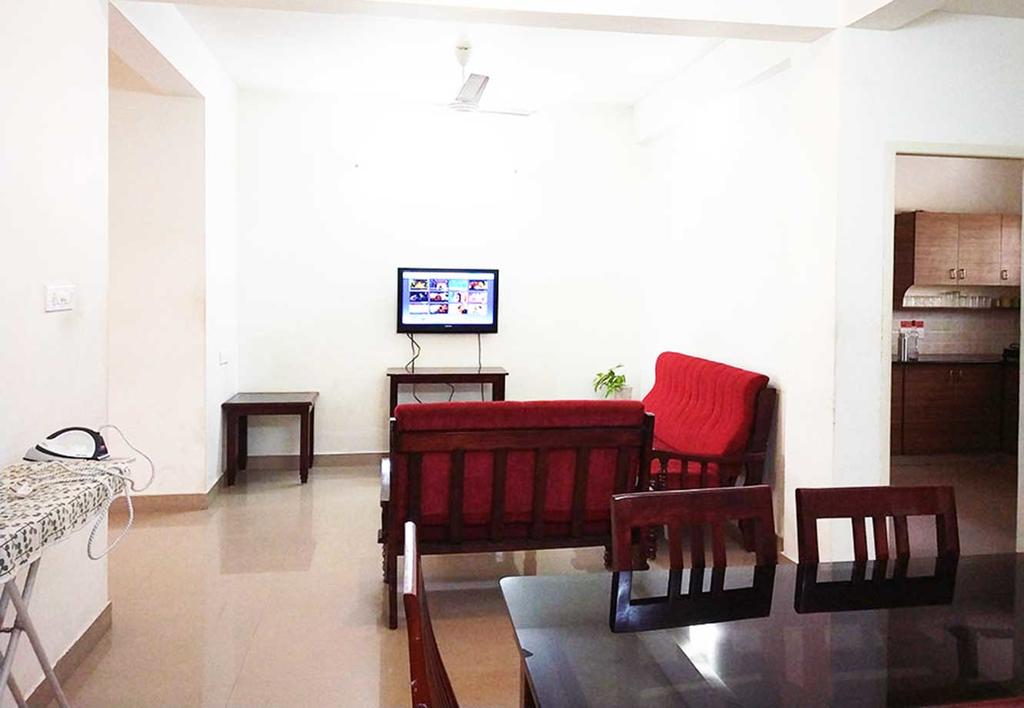 Honey Serviced Apartments Trivandrum - Tap to explore photos