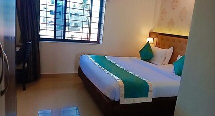 The Grand Krishna Luxury Hotel Room Type - Deluxe Room  AC