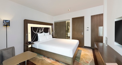 Novotel New Delhi Aerocity Room Type - Junior Suite -2 Way Airport Transfers, Lounge Access, 20 percent off on F&B and Laundry Novotel New Delhi Aerocity Room Type - Junior Suite -2 Way Airport Transfers, Lounge Access, 20 percent off on F&B and Laundry