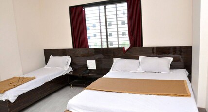 HOTEL SAI RAJARAM PALACE Room Type - Deluxe Triple Bed Non-A.C HOTEL SAI RAJARAM PALACE Room Type - Deluxe Triple Bed Non-A.C