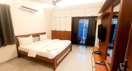 Vigneshwaraa Guest inn Room Type - Deluxe room with balcony iskon temple view