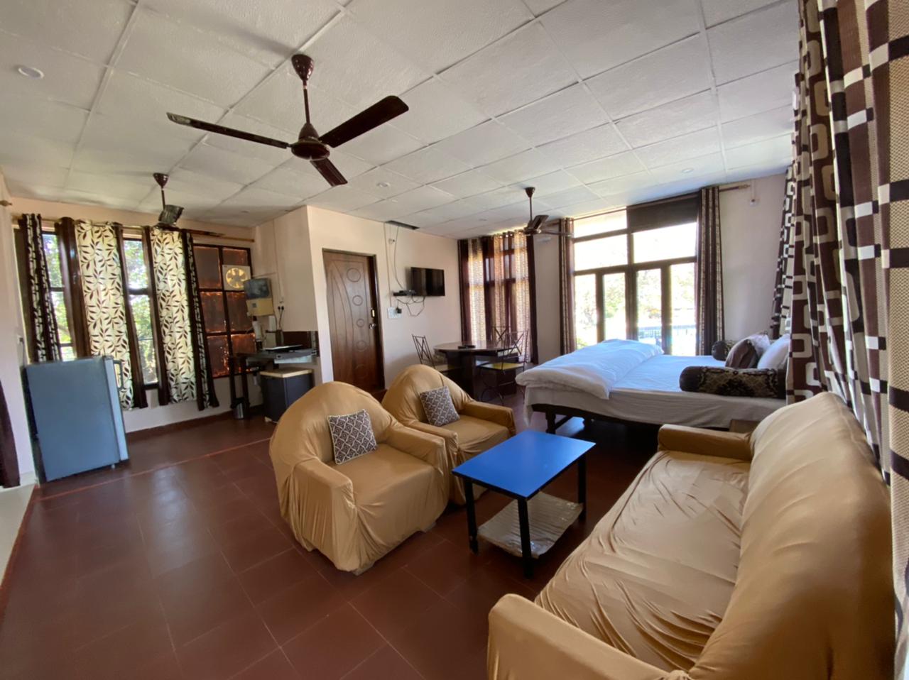 Oxygen Homestay | Rooms & Kitchen - Tap to explore photos