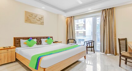 Treebo Sai Village Gold Souk - Sec 43 Room Type - Deluxe Room