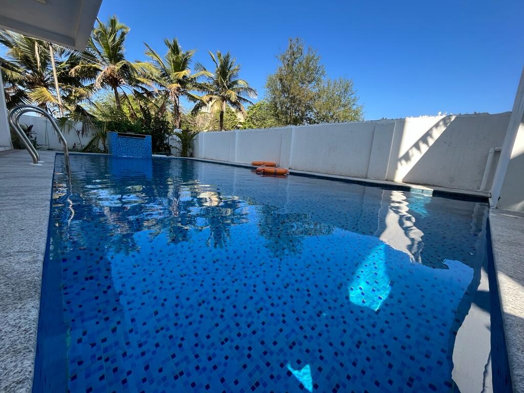 SS White Beach Villa - Tap to explore photos