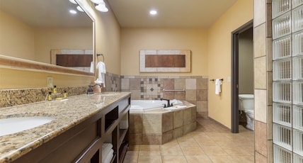 Best Western Plus Cimarron Hotel & Suites Room Type - Suite-1 King Bed, Non-Smoking, Sofabed, Whirlpool, Sitting Area, Vanity, Walk In Shower, Full Breakf