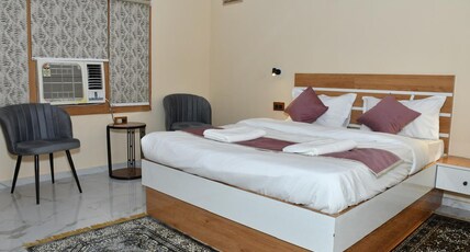 ABHIPSA-The Divine Guest House Room Type - Deluxe Room
