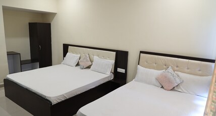 Hotel Amrit Vatika Room Type - Deluxe Room (Two Double Bed)