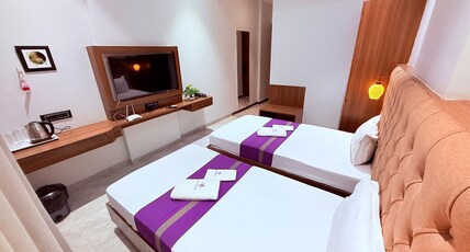 PURPLE LOTUS SUITES Room Type - Deluxe Twin Room