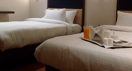 Hotel Grandeur Near Chakan MIDC Room Type - Deluxe Twin Bed Room with Work Desk
