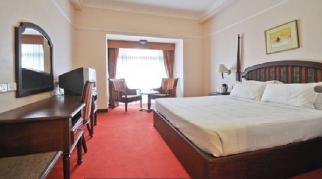 Holiday Hotel - Tap to explore photos