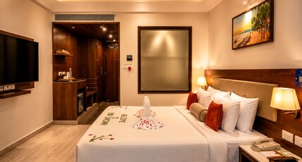 Sobit Sarovar Portico Room Type - Deluxe Double Room with Balcony