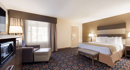 Best Western Butch Cassidy Inn Room Type - 1 Queen Bed, Non-Smoking, Wireless High-Speed Internet, Coffee Maker, Hairdryer, Iron And Ironing Bo Best Western Butch Cassidy Inn Room Type - 1 Queen Bed, Non-Smoking, Wireless High-Speed Internet, Coffee Maker, Hairdryer, Iron And Ironing Bo