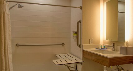Holiday Inn Express Hotel & Suites BYRAM Room Type - 1 King Standard Mobil Access Roll Shower Holiday Inn Express Hotel & Suites BYRAM Room Type - 1 King Standard Mobil Access Roll Shower