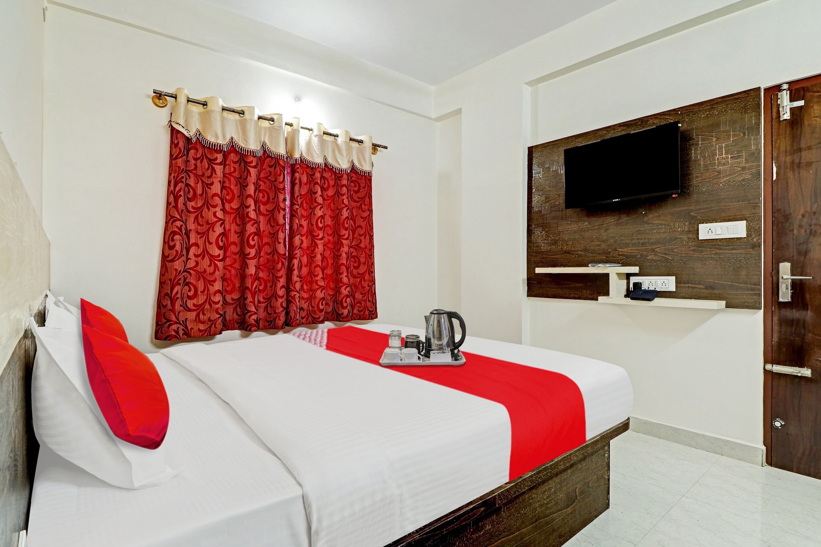 Hotel O New Town House - Tap to explore photos