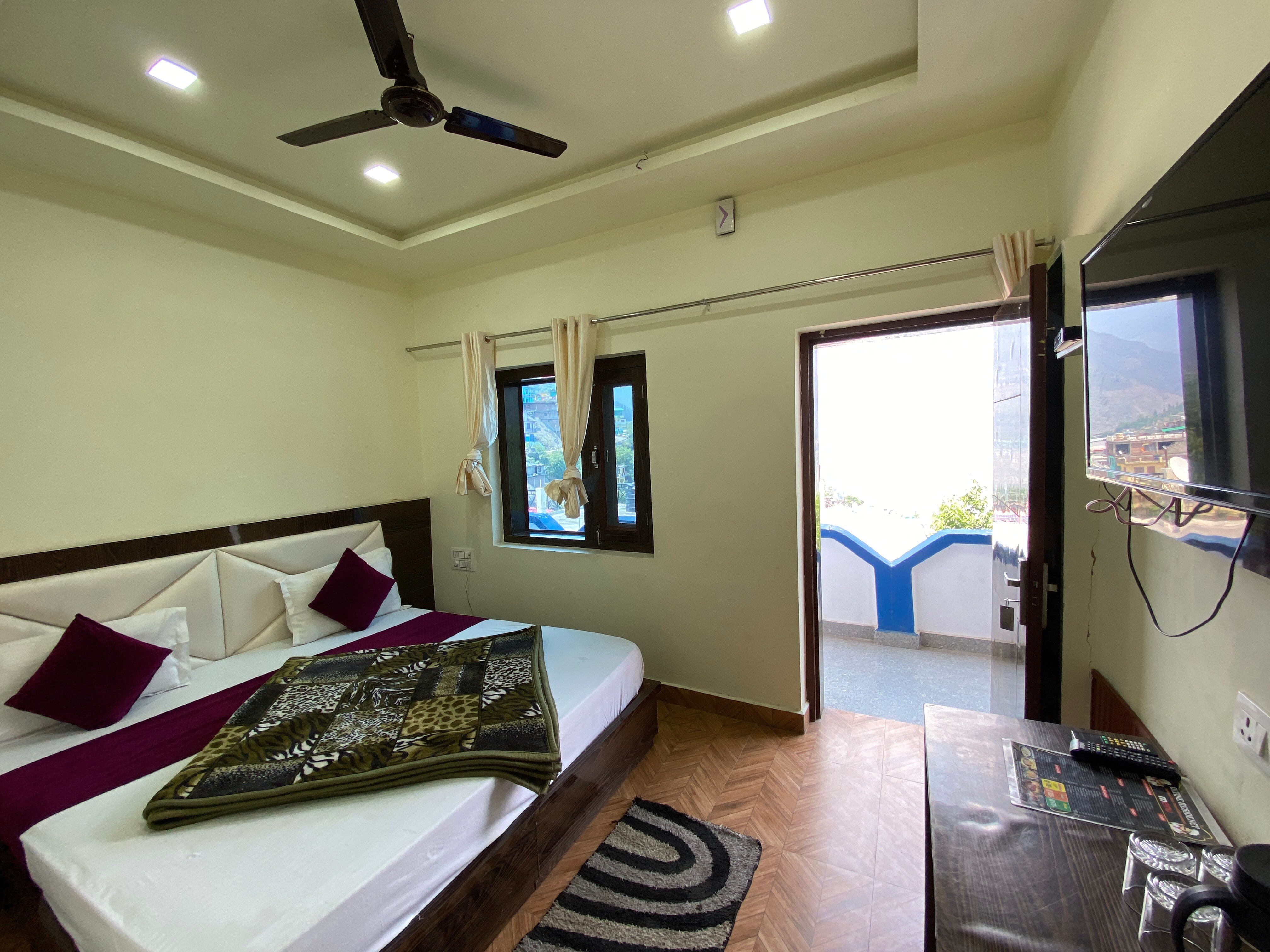 Hotel Divine Residency - Tap to explore photos