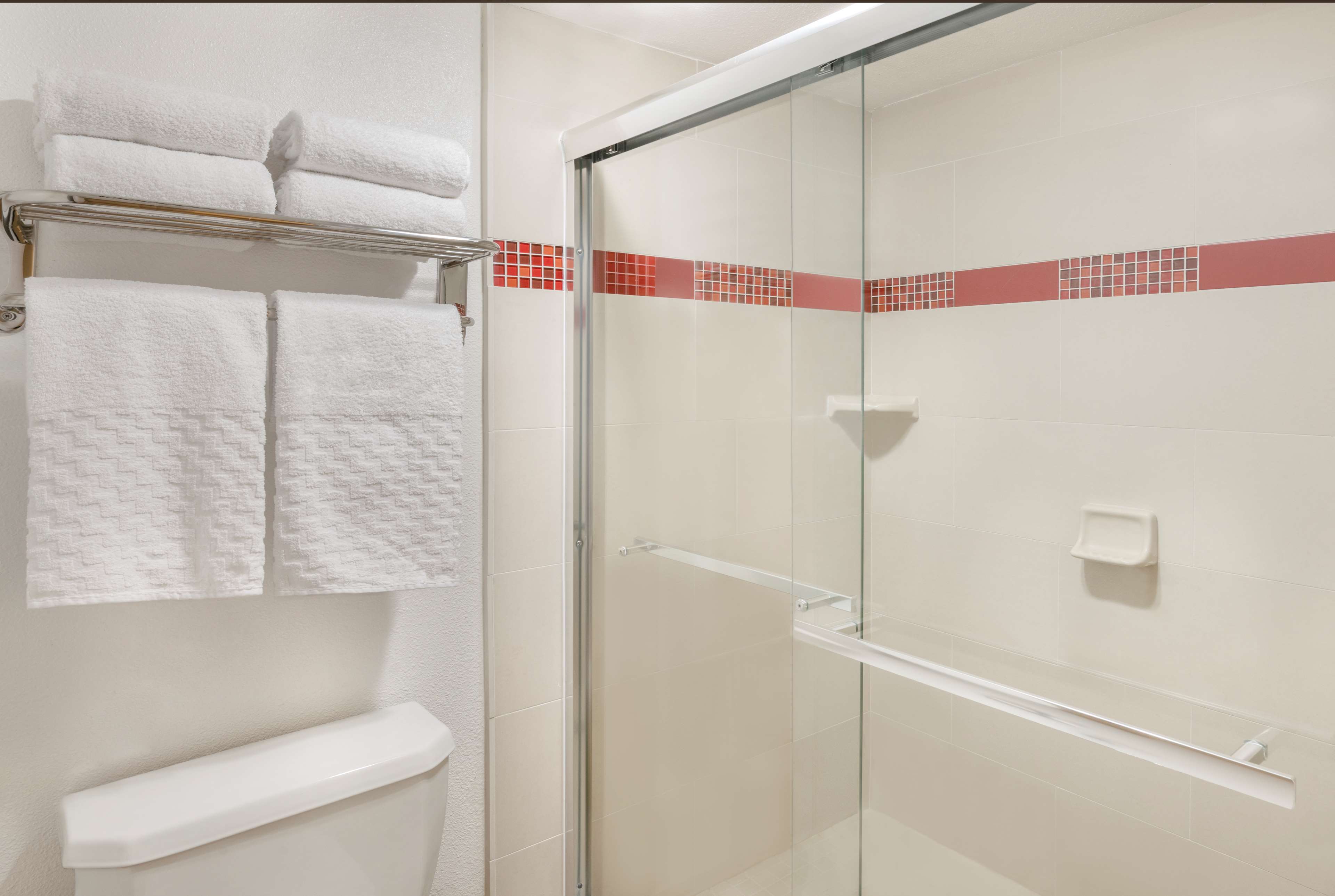 Best Western Plus Raffles Inn & Suites - Tap to explore photos