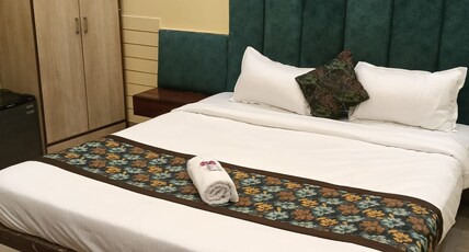 Hotel SKY HIGH Room Type - Deluxe Rooms