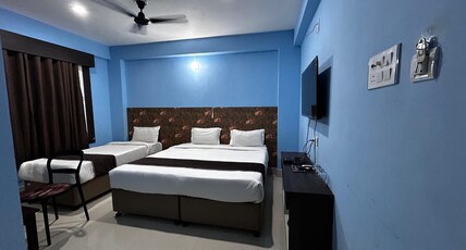 HOTEL ABINASH Room Type - Deluxe Ac Triple