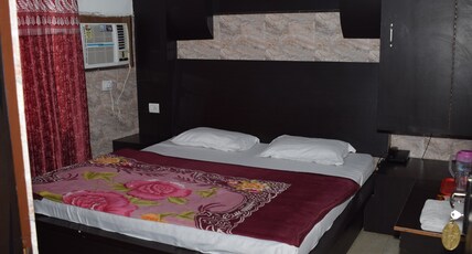 Pushpa Residency Room Type - Deluxe Double Bed Room