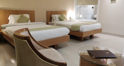 Hotel Kanha's Palm Springs Room Type - Twin Bed Room With Bathtub Hotel Kanha's Palm Springs Room Type - Twin Bed Room With Bathtub