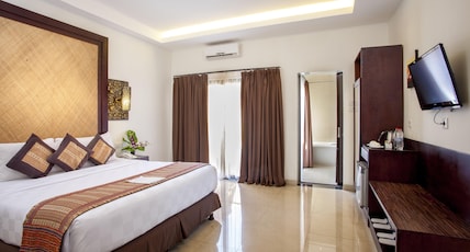 Best Western Kuta Villa Room Type - 1 Queen Bed, Smoking Room, Deluxe Room, Flat Screen Television, Safe Deposit Box, Coffee Maker, Bath Best Western Kuta Villa Room Type - 1 Queen Bed, Smoking Room, Deluxe Room, Flat Screen Television, Safe Deposit Box, Coffee Maker, Bath