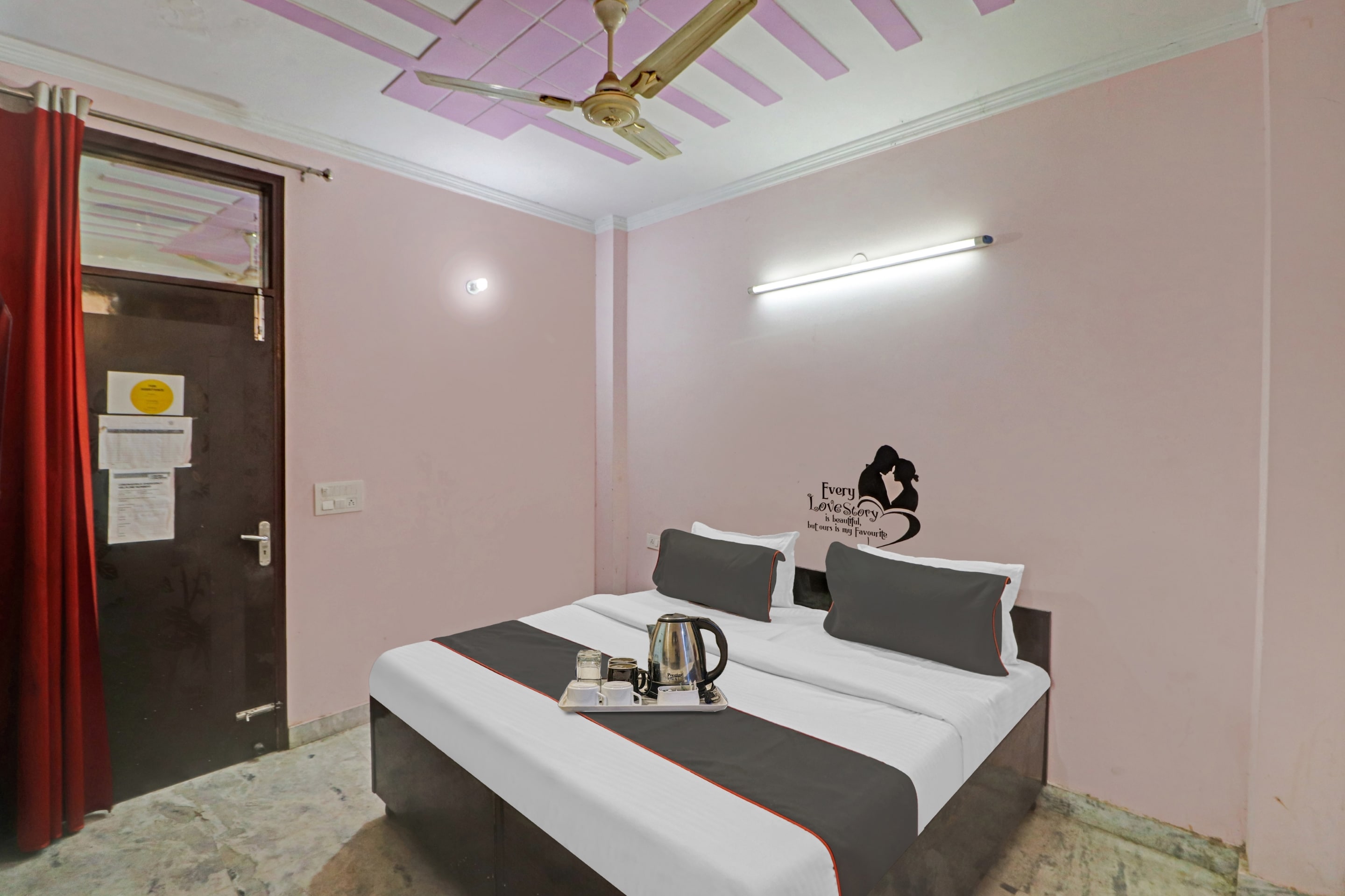 Hotel O Premium Room - Tap to explore photos