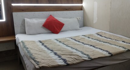 HOTEL GURU KALGIDHAR RESIDENCY Room Type - Deluxe Room