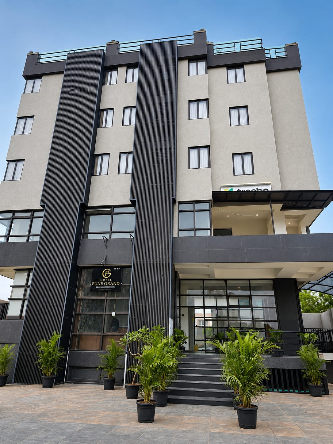 Hotel Pune Grand - Tap to explore photos
