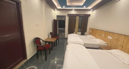 Hotel Kailash Room Type - Quad Deluxe Room with River View King Bed