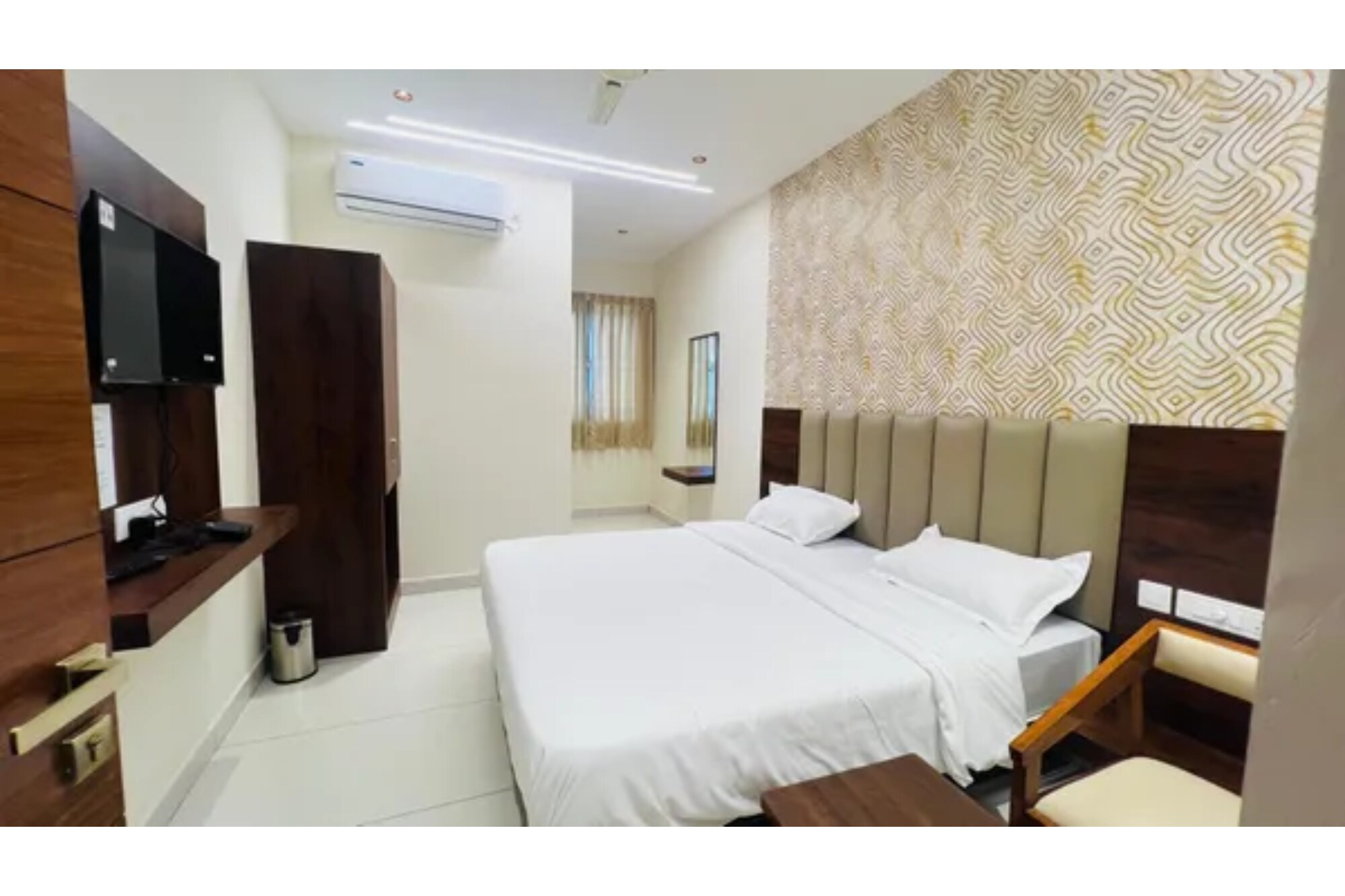 FabHotel Golden Inn KR Puram - Tap to explore photos