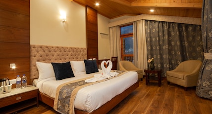 Ashapuri Village Resort & Banquet Room Type - Royal Retreat (Mountain View with Balcony) Ashapuri Village Resort & Banquet Room Type - Royal Retreat (Mountain View with Balcony)
