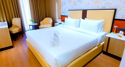 Pride Premier Greater Noida Room Type - Delxue Room