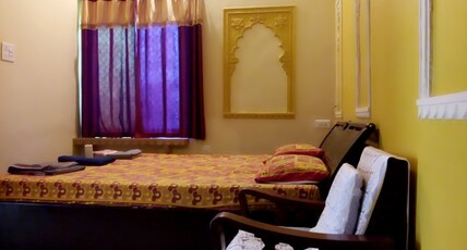 shivam tourist guest house.. Room Type - Deluxe Room with King Bed