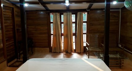 Eisra Wellness Retreat | Rooms & Caretaker Room Type - King Cottage With Balcony