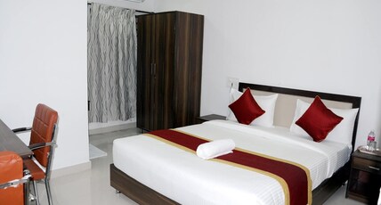 HOTEL ORANGE SUITES Room Type - Deluxe Room Non AC